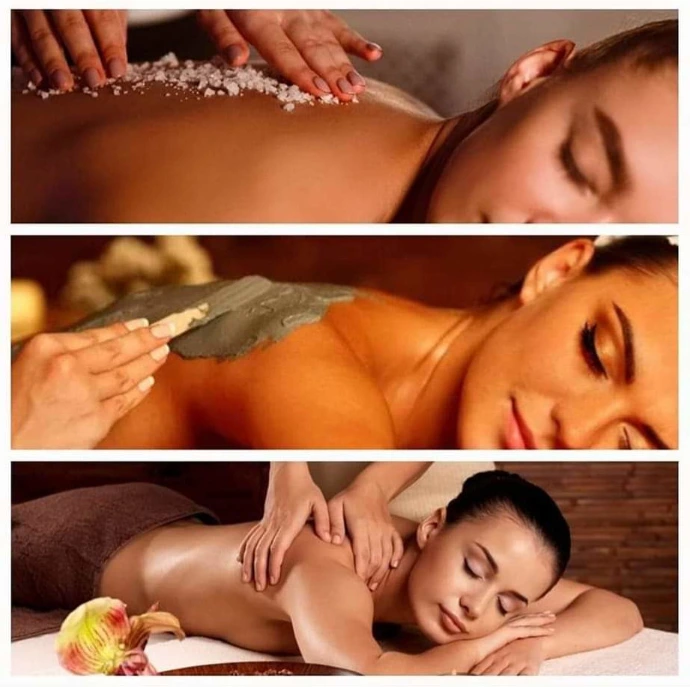 Gommage, soins et massage sur le dos d'une femme